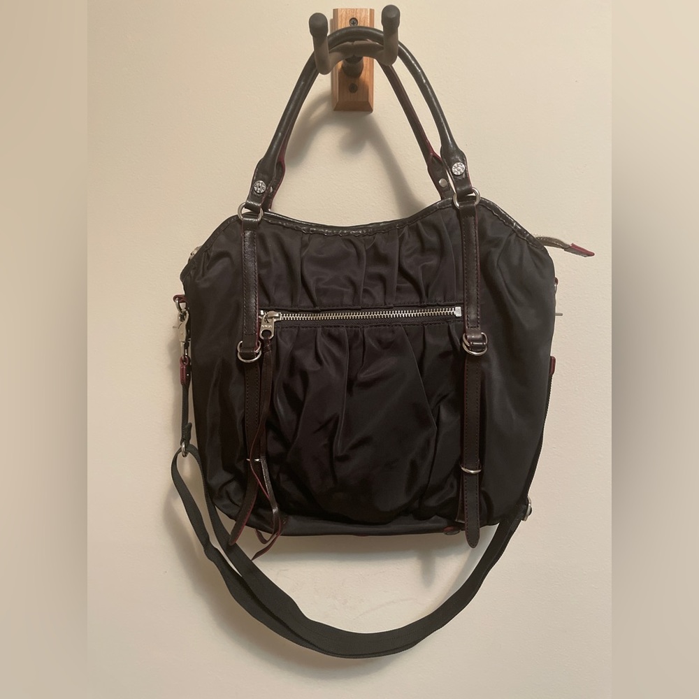 MZ Wallace black nylon cargo bag with leather trim and tassels